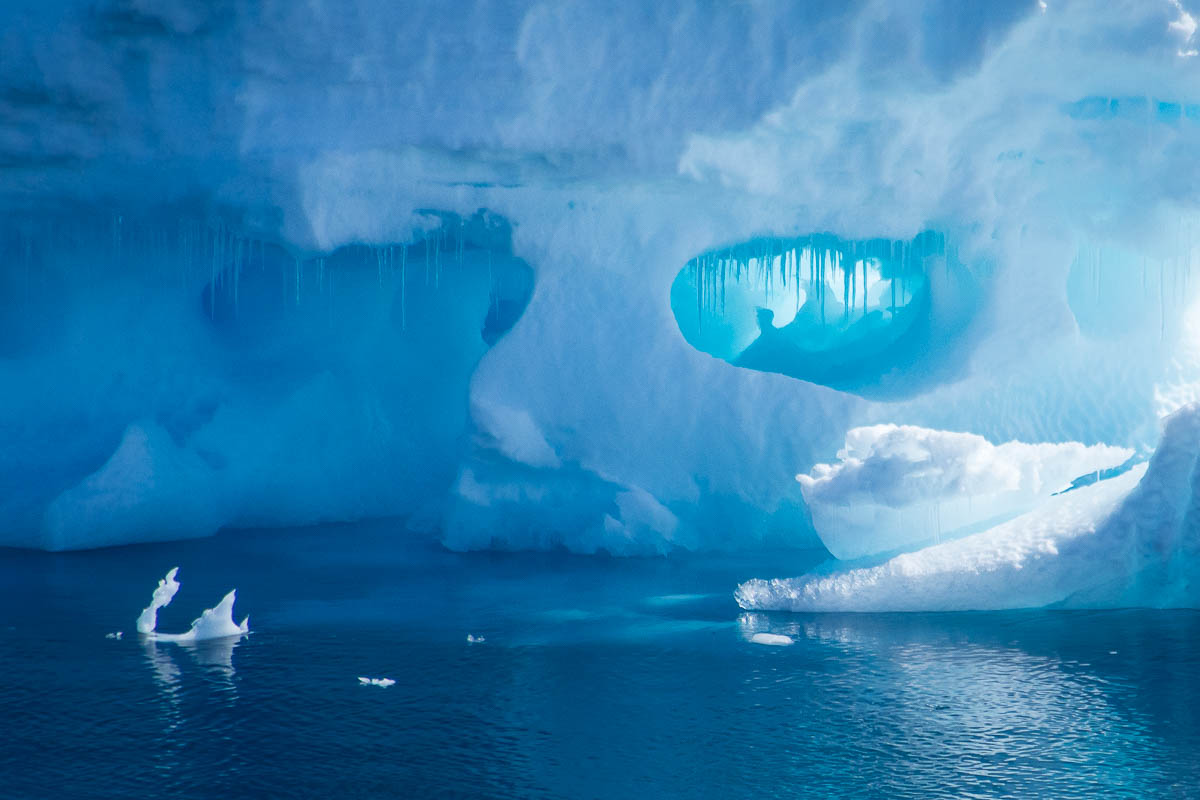 Iceberg with blue hole.