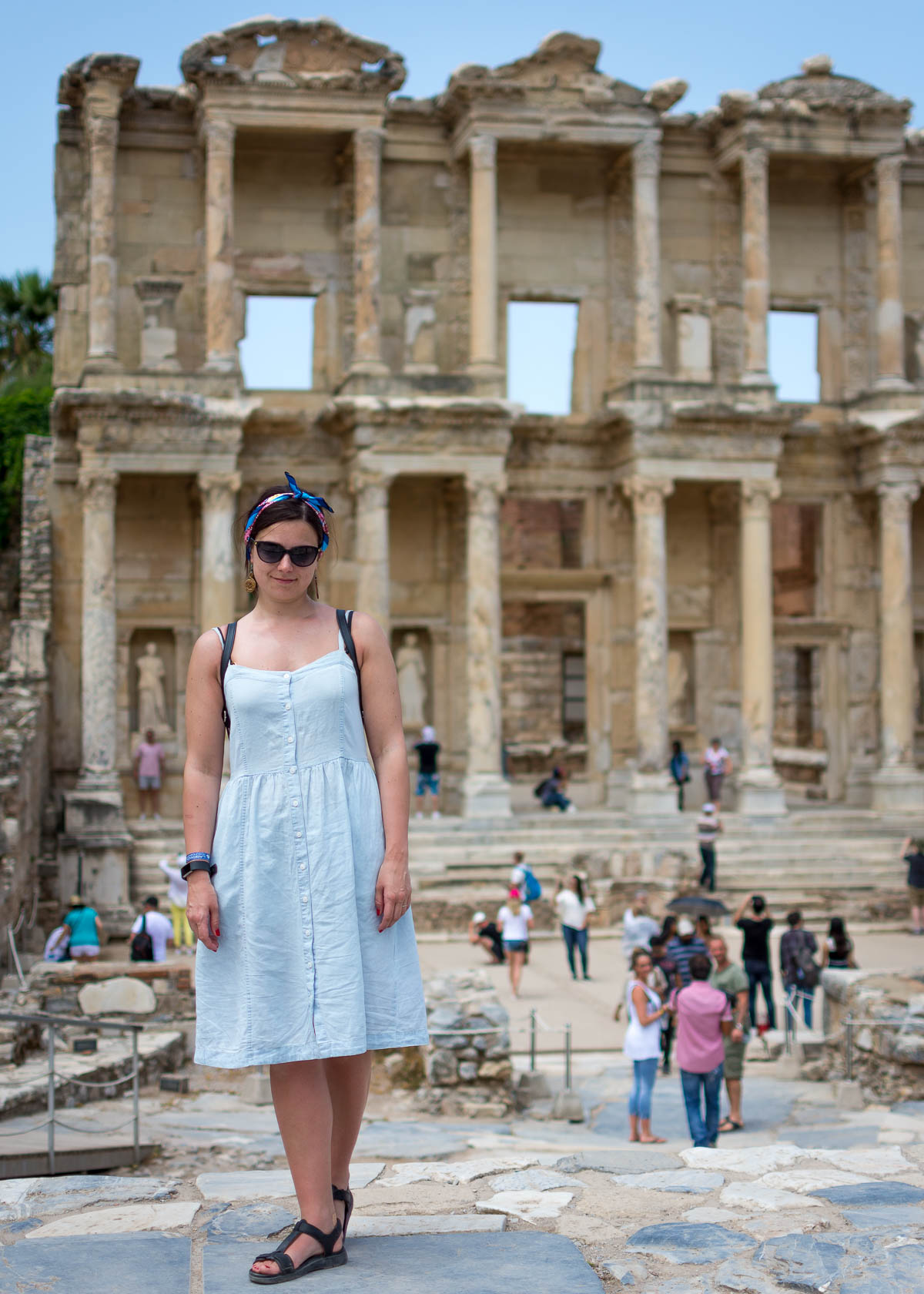 Woman standing in front of the Library of Celsus, Ephesus, Turkey
