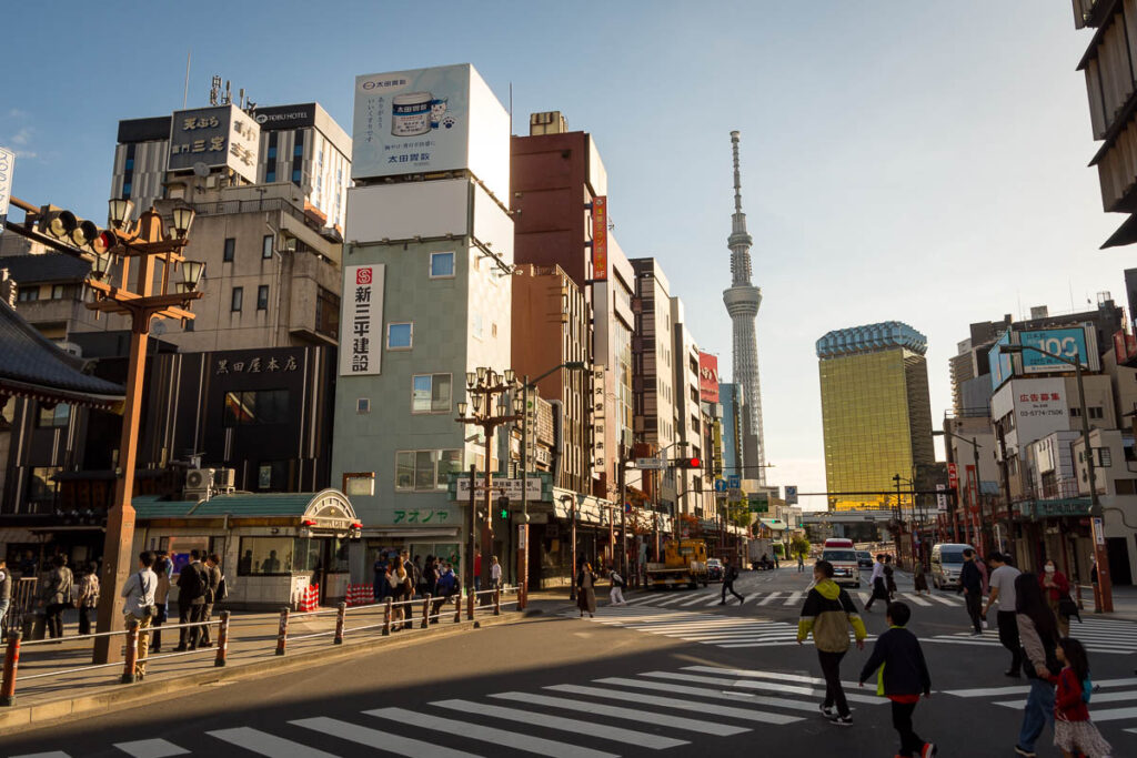 View of Tokyo Skytree with a zebra crossing in the foreground.