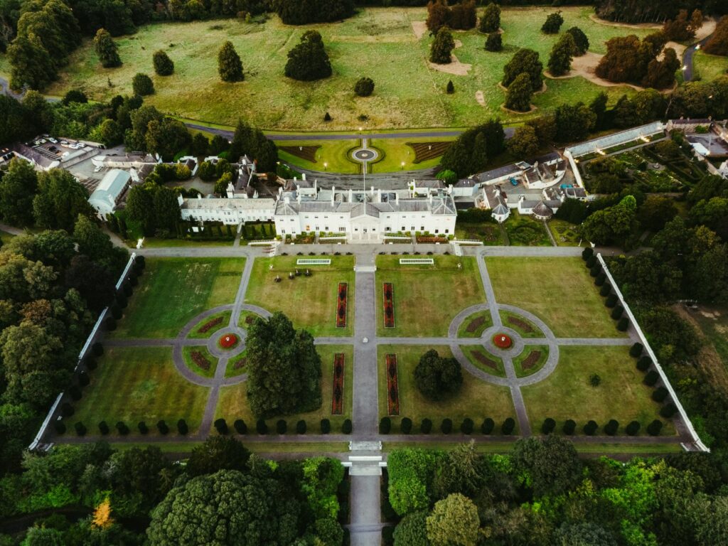 Stunning aerial view of a grand estate in Dublin, Ireland, showcasing manicured gardens and historic architecture.
