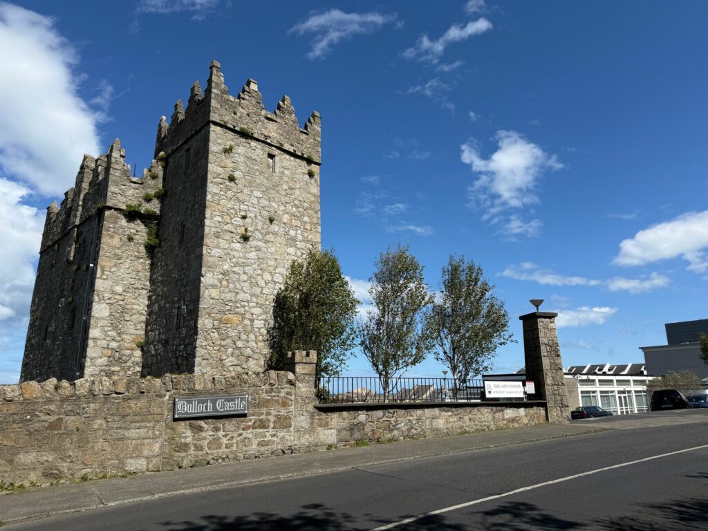 Discover the medieval architecture of Bulloch Castle, a stunning landmark in Dublin under clear blue skies.