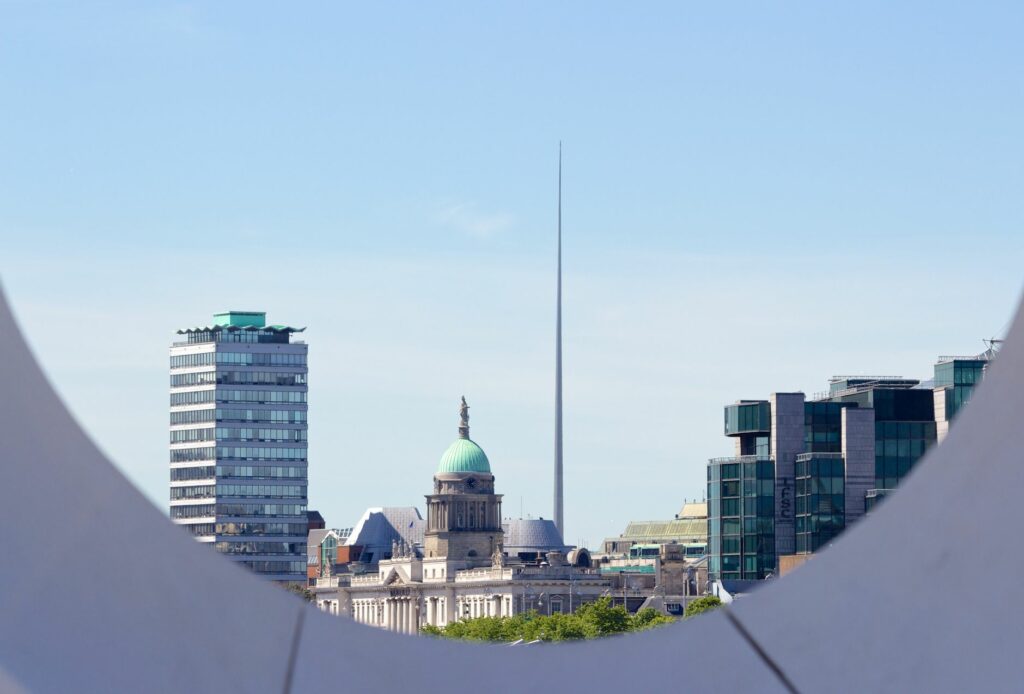 A captivating view of Dublin's skyline, showcasing The Spire and historic Custom House.