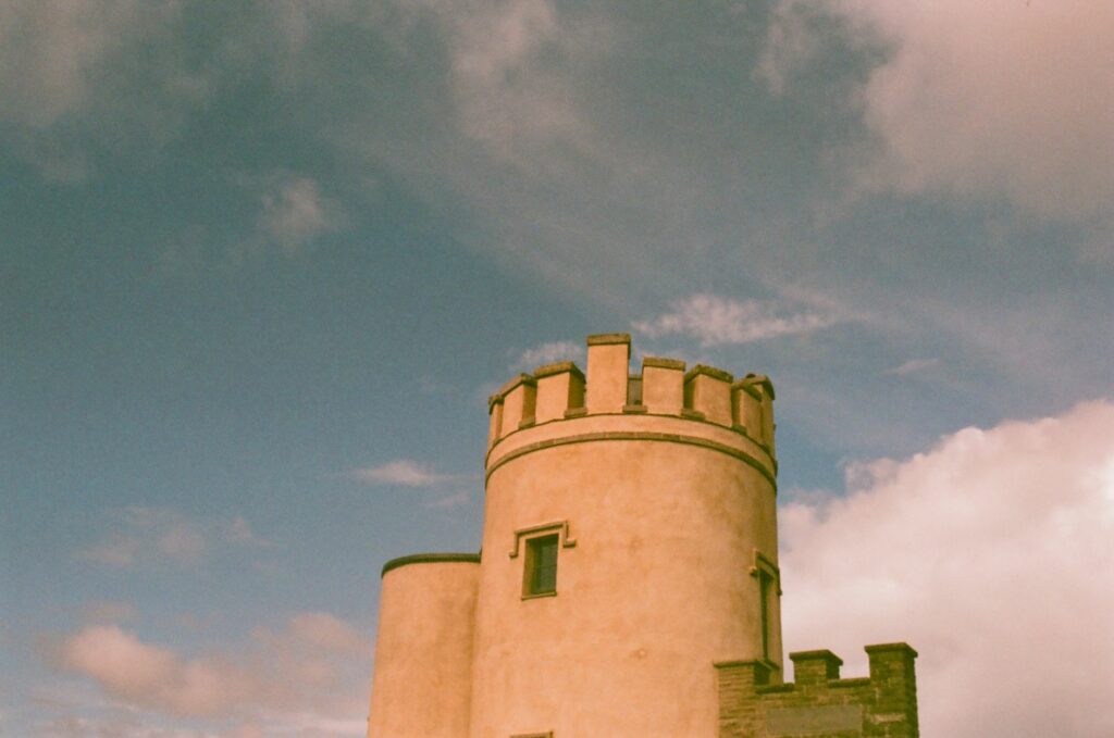 O'Brien's Tower, an iconic Irish landmark, captured against a dramatic cloudy sky.