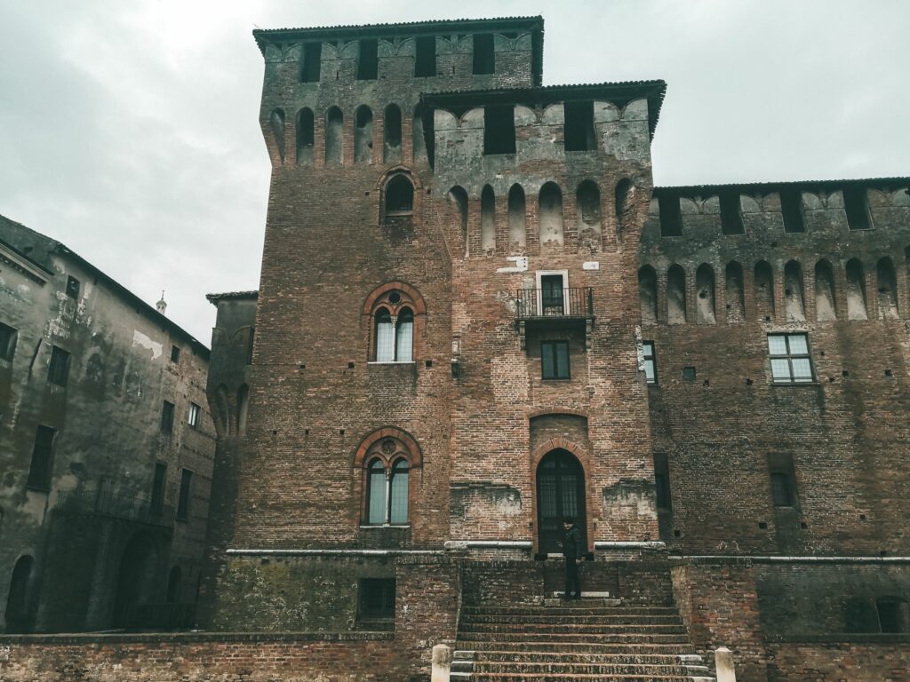 A captivating view of a historic castle with prominent brick architecture and medieval design.