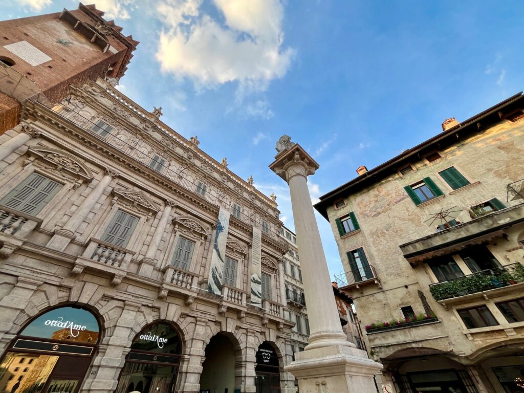 A captivating view of historical architecture in Verona, Italy under a clear blue sky.
