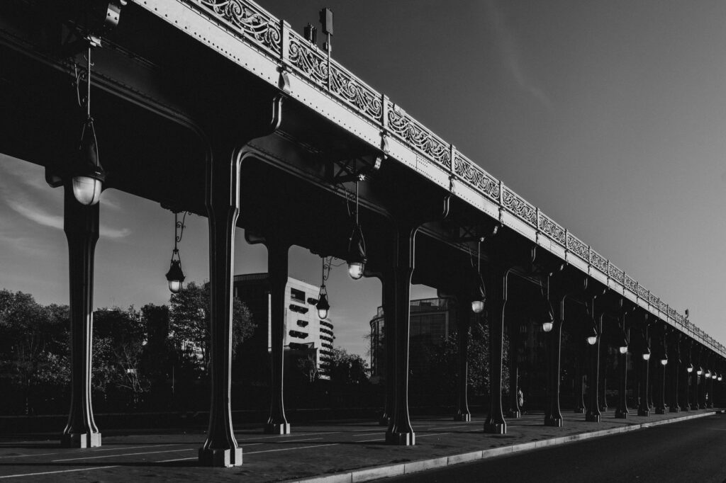 Dramatic monochrome perspective of Pont de Bir-Hakeim, Paris.